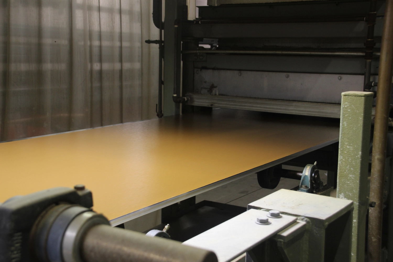 Sheet metal processing in an industrial machine.